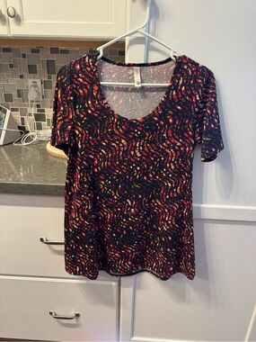 Women’s Black Scoop Neck Printed Tee with Pink and Yellow Accents